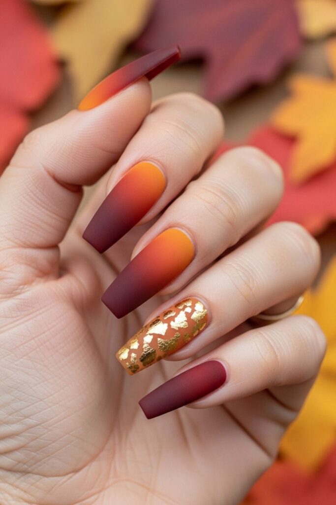a girl showing her fall nail deisgn